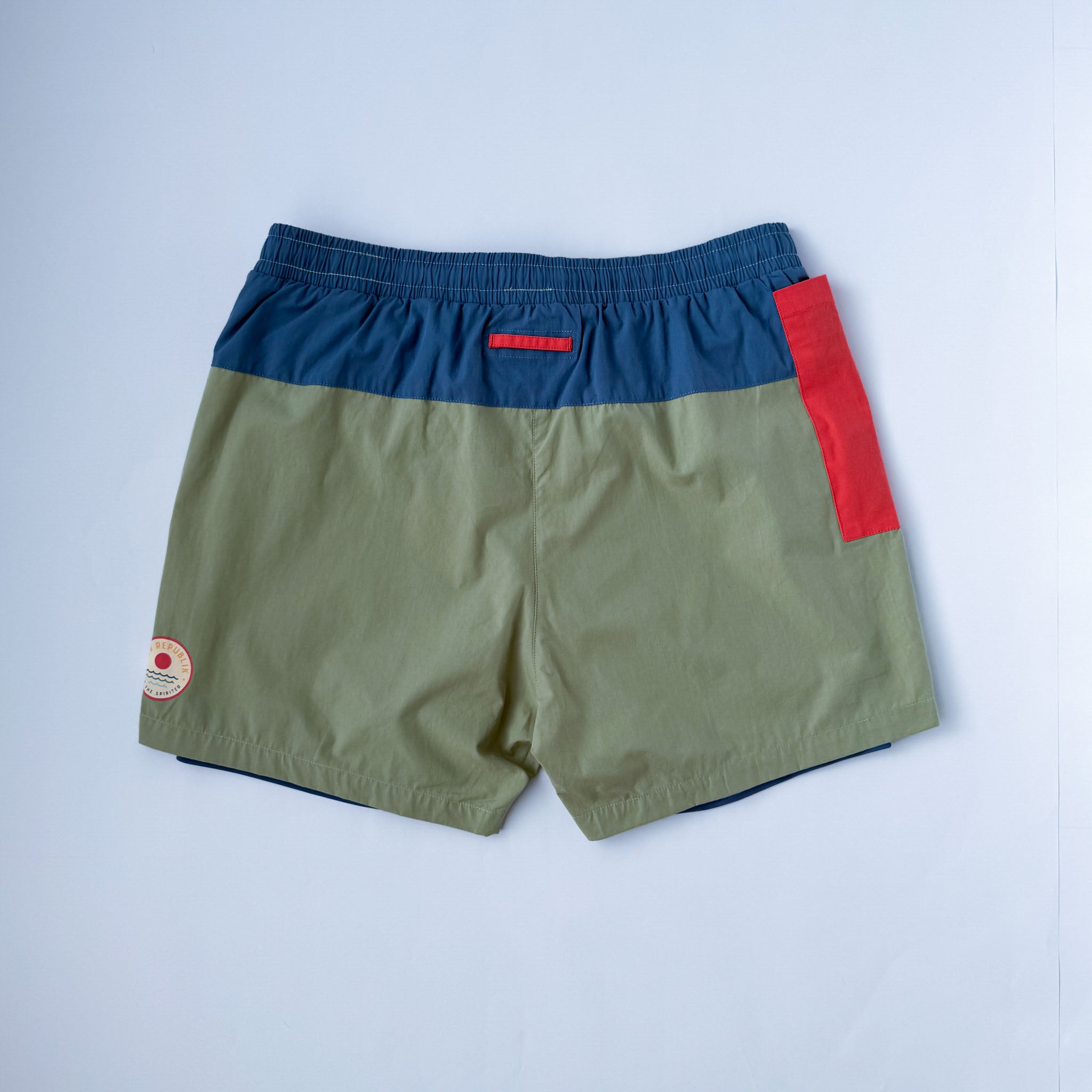 Back view of men swimwear with inner liner and phone pocket  On white background. 