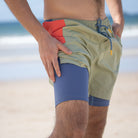 all-groups Man on beach showing men swimwear with inner liner.